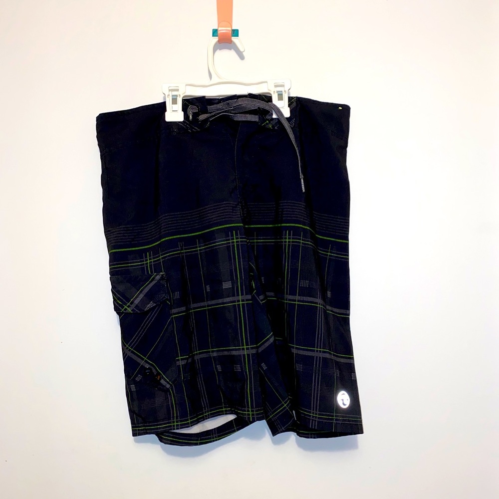 Men’s black plaid-like swim trunks in a size 30